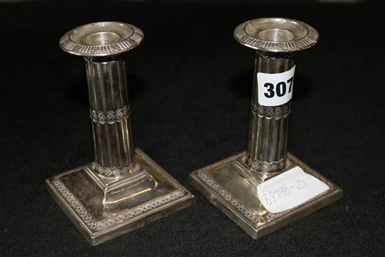 Pair of silver candlesticks